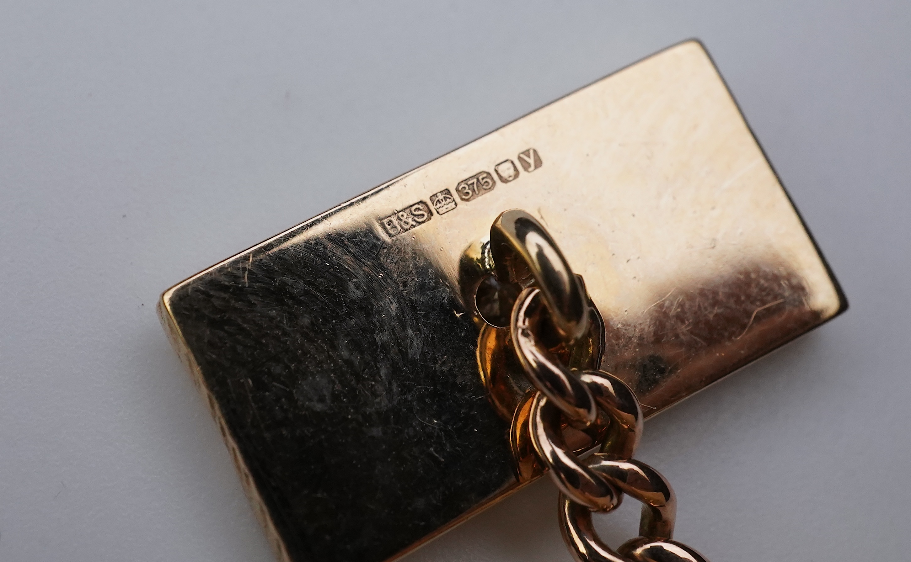 A pair of 9ct gold and diamond cufflinks, 1970s